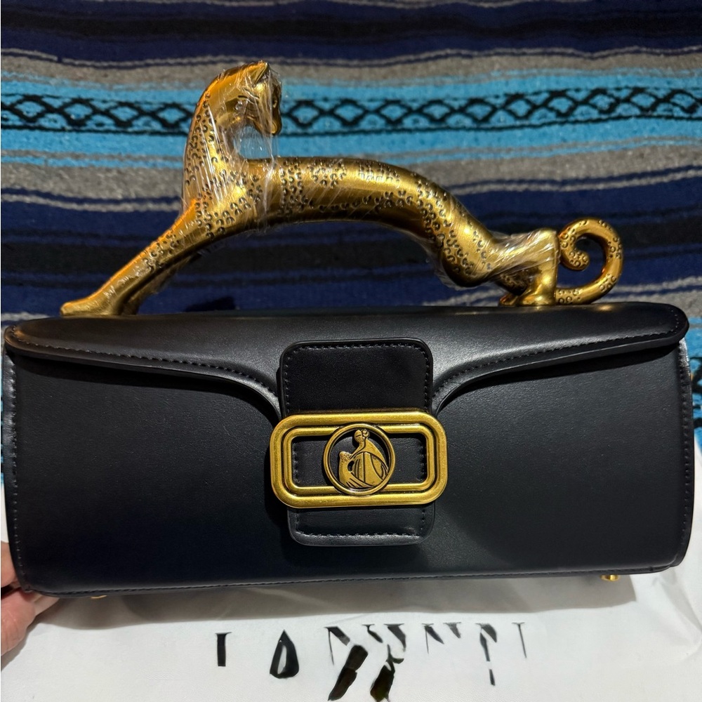 Elegant Black Cat Handbag with Gold Accents